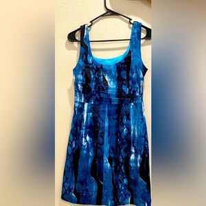Beautiful Blue/ Black print  sleeveless Tahari dress (lined). Great condition!